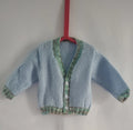 Hand knitted 6-12 months baby boys cardigan, baby blue and green edging