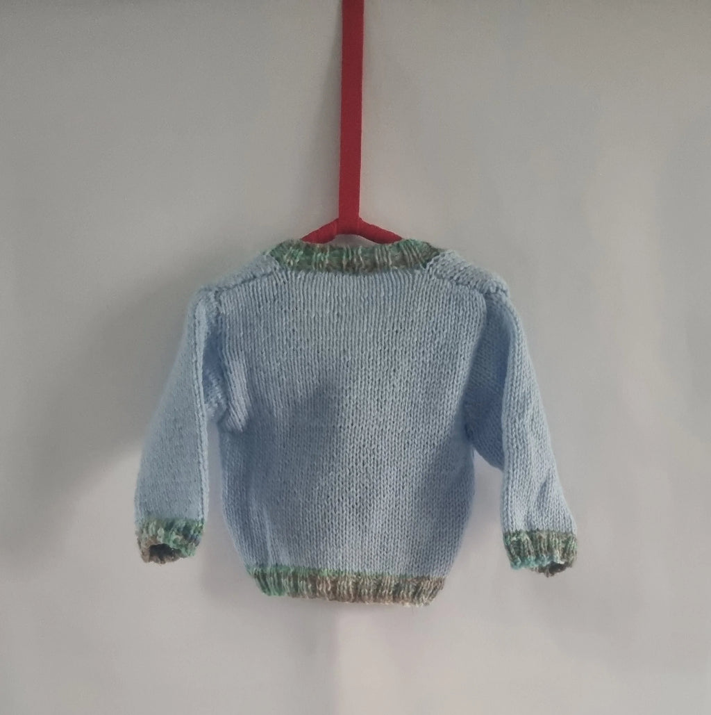 Hand knitted 6-12 months baby boys cardigan, baby blue and green edging