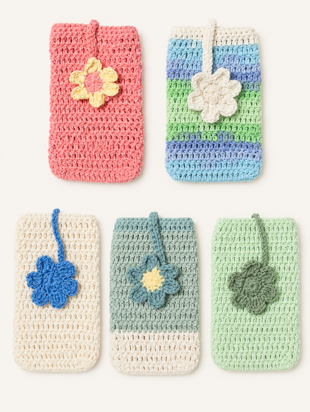 Five crocheted phone pouches arranged in a 2x3 grid on a light cream background. The pouches come in pink, striped blue/green/lavender, cream with blue flower, light blue with blue flower, and mint green with olive flower.