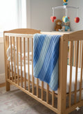 Handmade crochet striped baby blanket - in three soft blues