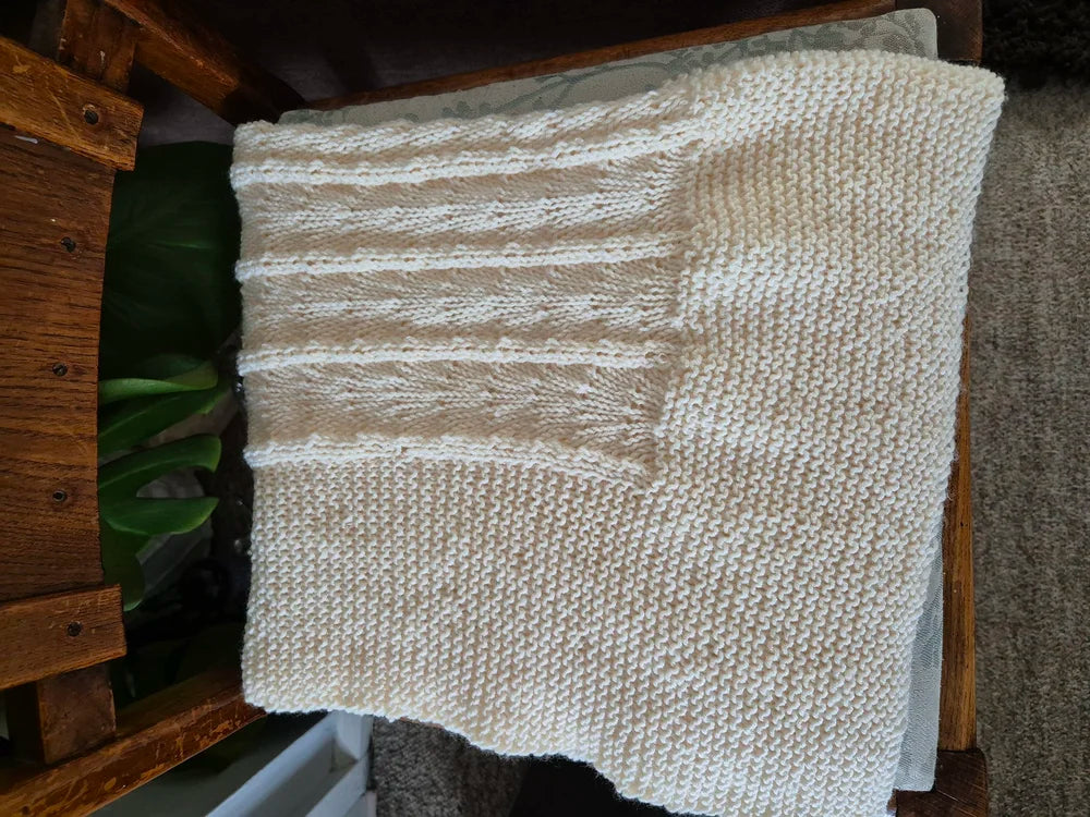 Hand Knitted gender neutral baby blanket - sustainable and eco-friendly