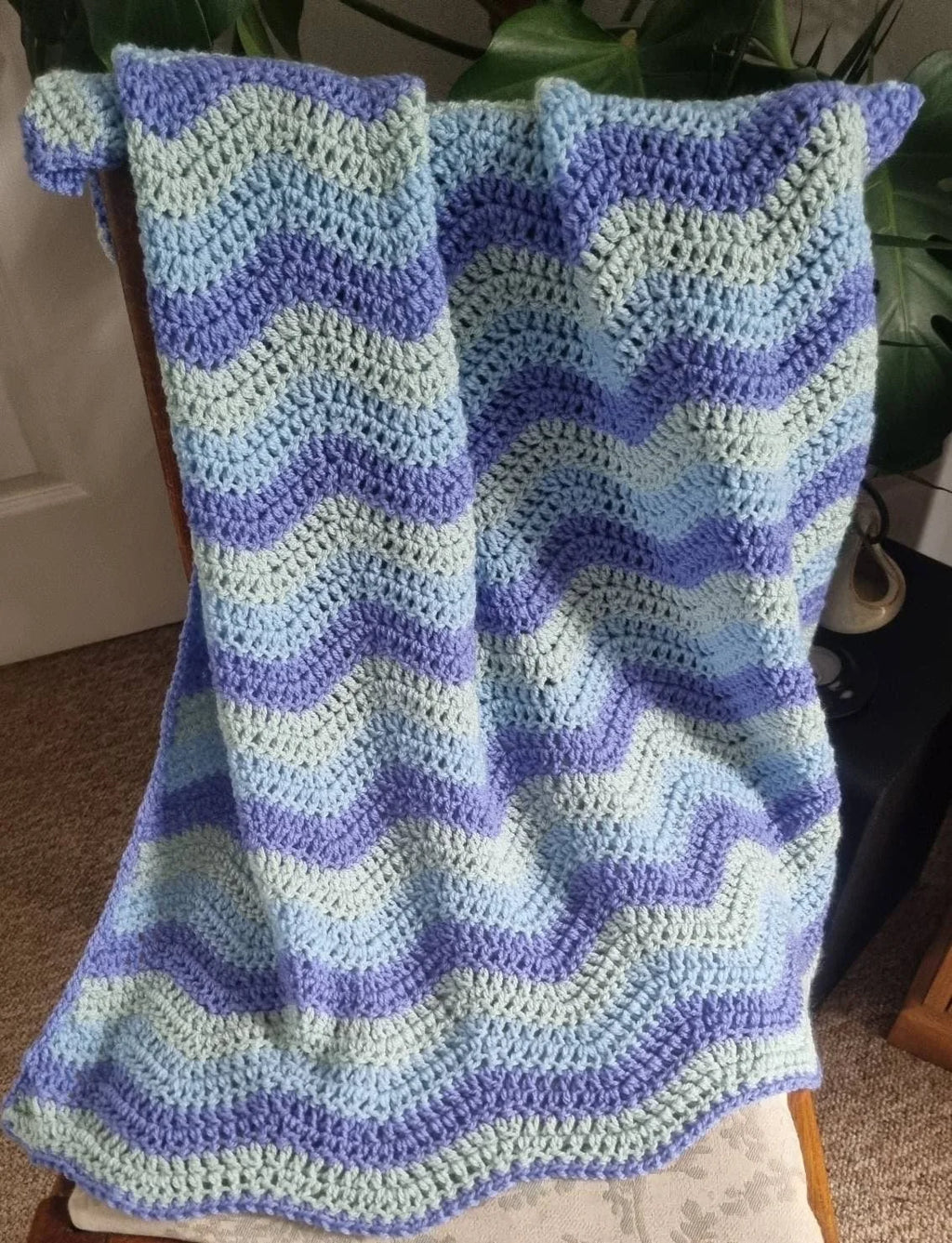 Hand crochet ripple blanket in tones of blue