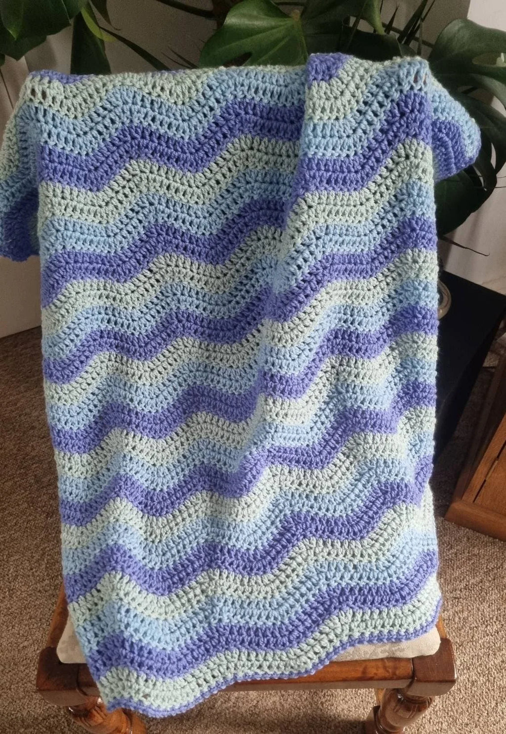 Hand crochet ripple blanket in tones of blue