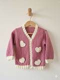Hand-knitted cardigan aged 12m to 2 years  Pink with ivory crochet hearts .