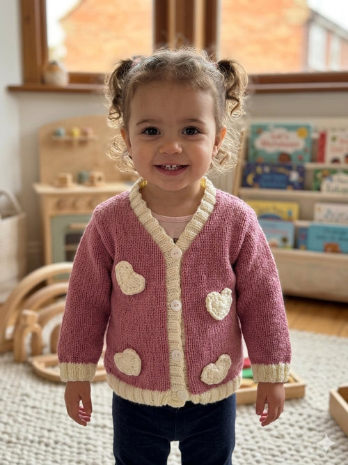 Hand-knitted cardigan aged 12m to 2 years  Pink with ivory crochet hearts .